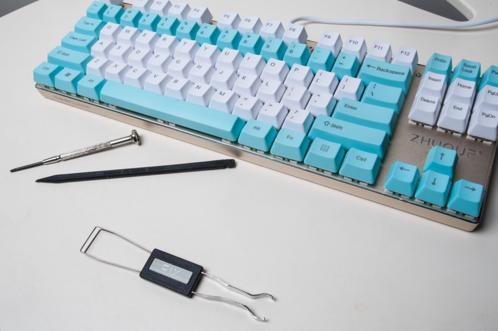 Modding a blue Outemu switch for a mechanical keyboard in order to remove the "click" sound and maintain tactility - Ryan MacLean @ Blandname.com