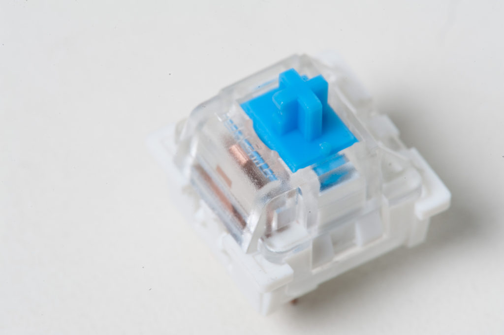 Modding a blue Outemu switch for a mechanical keyboard in order to remove the "click" sound and maintain tactility - Ryan MacLean @ Blandname.com