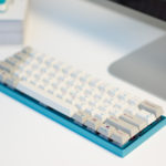 Custom keyboard with Zeal60, Zealiostotlespacers, Enjoy PBT Kana Keycaps, Sentraq Teal Plate and Case - Ryan MacLean