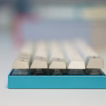 Custom keyboard with Zeal60, Zealiostotlespacers, Enjoy PBT Kana Keycaps, Sentraq Teal Plate and Case - Ryan MacLean